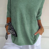 Solene | Top Pull Oversize a Col en V