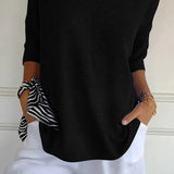 Solene | Top Pull Oversize a Col en V